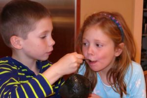 Max feeding Anna leftovers