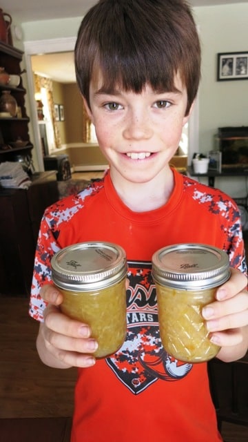 Conner holding marmalade jars